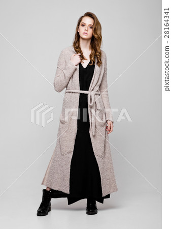 Young beautiful fashion model wearing knitwear Young beautiful fashion model wearing knitwear 28164341