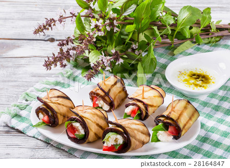 Vegetarian Eggplant Rolls with feta cheese 28164847