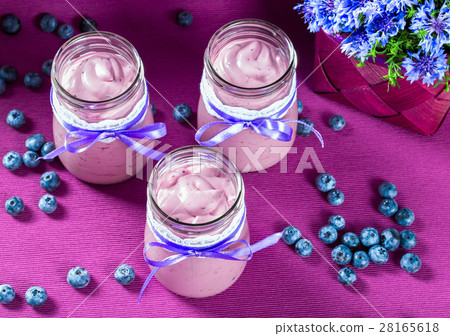 yogurt with blueberries and mint, close-up yogurt with blueberries and mint, close-up 28165618