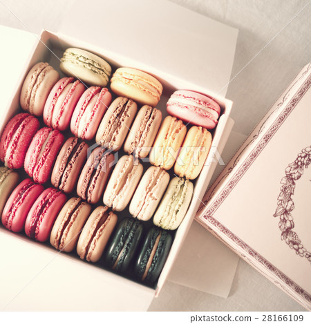 Vintage colorful french macarons in a box Vintage colorful french macarons in a box 28166109