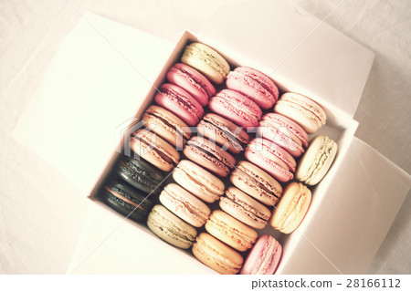 Vintage colorful french macarons in a box Vintage colorful french macarons in a box 28166112