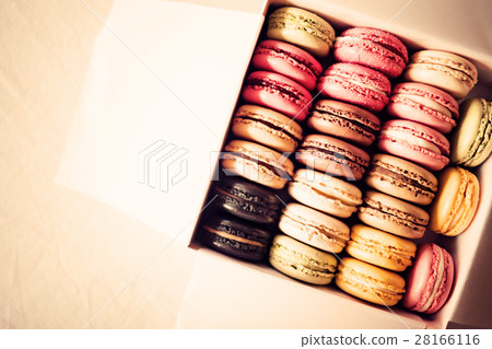 Vintage colorful french macarons in a box Vintage colorful french macarons in a box 28166116
