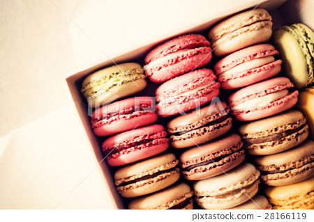 Vintage colorful french macarons in a box Vintage colorful french macarons in a box 28166119