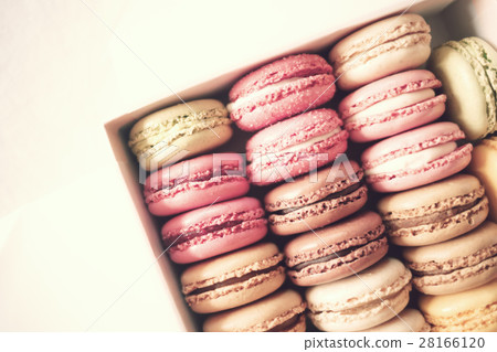 Vintage colorful french macarons in a box Vintage colorful french macarons in a box 28166120