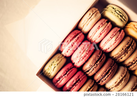 Vintage colorful french macarons in a box Vintage colorful french macarons in a box 28166121