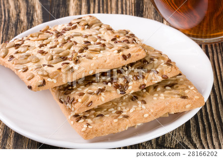 crispy bread with seeds of sunflower, flax and crispy bread with seeds of sunflower, flax and 28166202