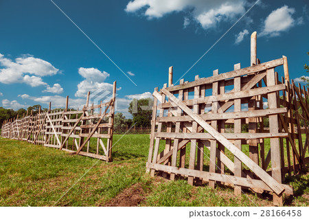 wooden rustic fence and village landscape 28166458