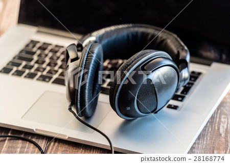 headphones on the laptop headphones on the laptop 28168774