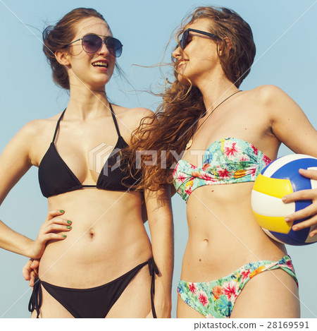 Women Friendship Playing Volleyball Beach Summer Concept 28169591