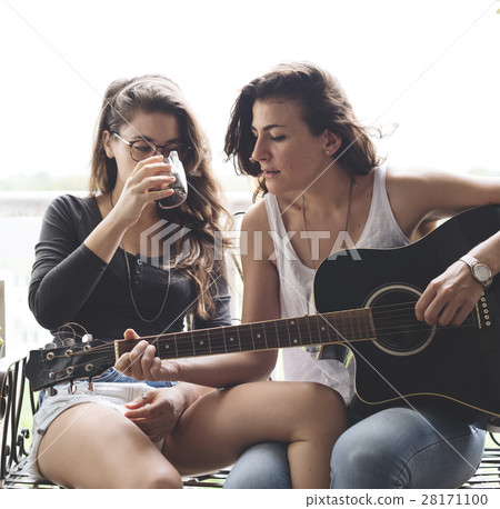 Lesbian Couple Together Indoors Concept Lesbian Couple Together Indoors Concept 28171100