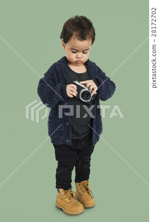 Curious Little Boy Holding Camera Concept 28172702