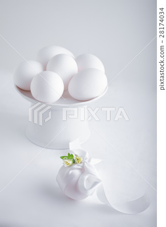 Eggs with flowers on a white background. Easter 28174034
