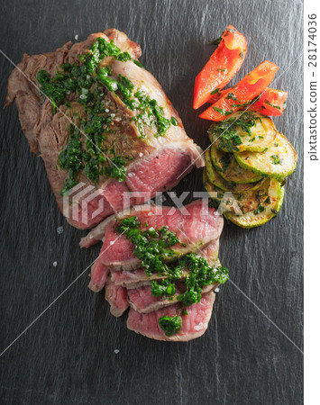Roast Beef dinner with roasted zucchini 28174036