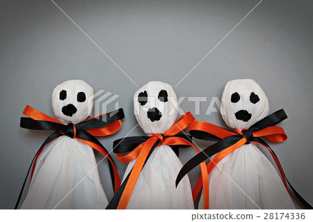 Halloween ghosts on gray background 28174336
