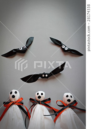 Halloween ghosts and bats on gray background 28174338