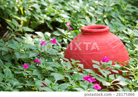 Colorful pot decorated in a garden 28175866