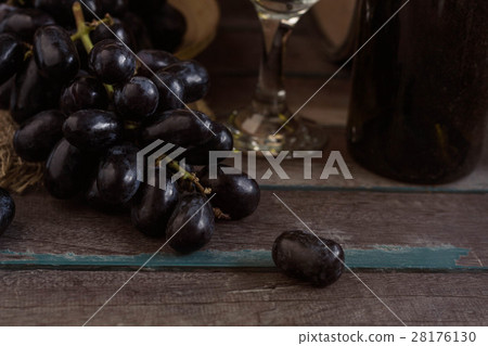 grapes and wine on a wooden. 28176130
