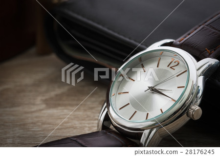 Close up watch and wallet Close up watch and wallet 28176245