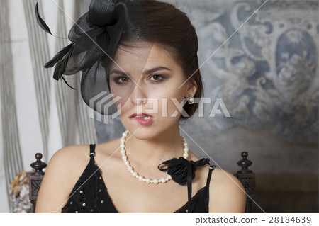 Portrait of retro style woman 28184639