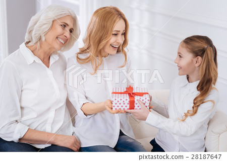 Positive mother and grandmother congratulating Positive mother and grandmother congratulating 28187647