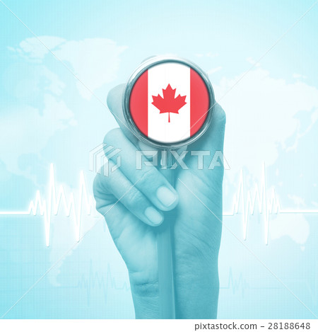 hand holding stethoscope with Canada flag. 28188648