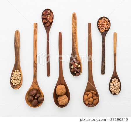 Different kind of beans and lentils in wooden spoo Different kind of beans and lentils in wooden spoo 28190249