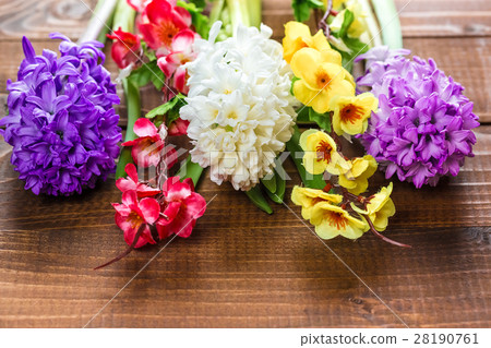 Fresh hyacinth flowers on wooden background Fresh hyacinth flowers on wooden background 28190761