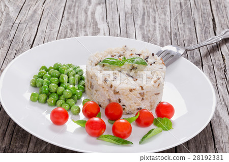 wild rice with cherry tomatoes, green peas wild rice with cherry tomatoes, green peas 28192381