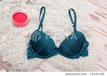 Fashion concept. Emerald bra with artificial fur Fashion concept. Emerald bra with artificial fur 28193166