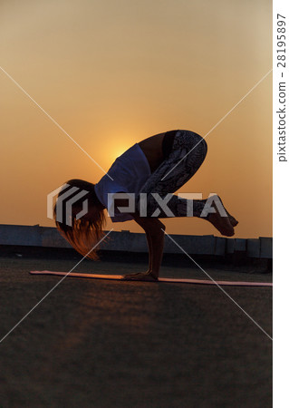 Young woman practicing yoga Young woman practicing yoga 28195897