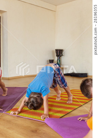 Little boy on a yoga class 28196355