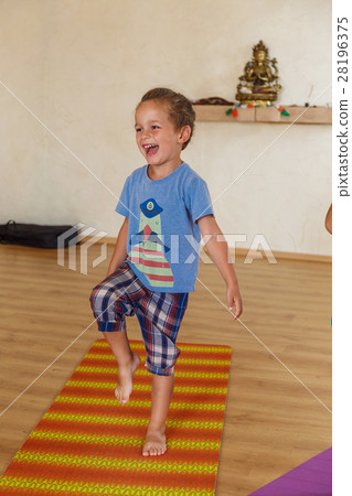 Little boy on a yoga class 28196375