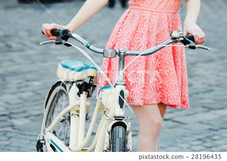 girl with bicycle on the street with retro bicycle girl with bicycle on the street with retro bicycle 28196435
