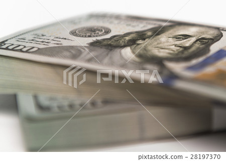Stack of money in US dollars cash banknotes Stack of money in US dollars cash banknotes 28197370