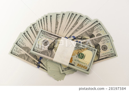 Stack of money in US dollars cash banknotes 28197384