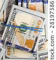 Packs of hundred dollar bills 28197386