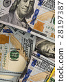 Packs of hundred dollar bills 28197387