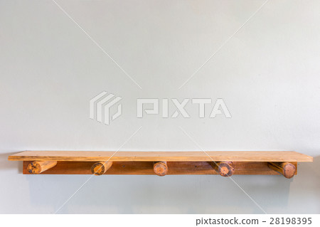 Empty top wooden shelves on white cement wall 28198395