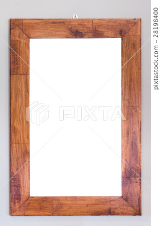 Empty wooden frame hanging on the wall. Interior decoration Empty wooden frame hanging on the wall. Interior decoration 28198400
