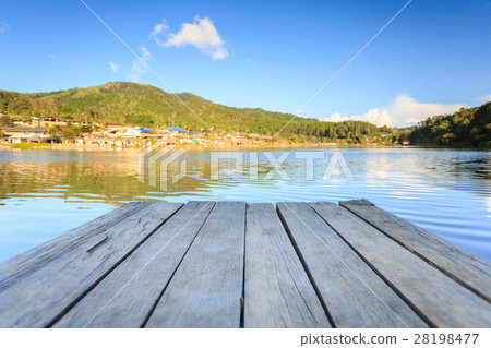 Empty wooden floor or decking beside the lake Empty wooden floor or decking beside the lake 28198477
