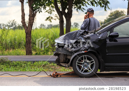 Black car get damaged by accident on the road 28198523