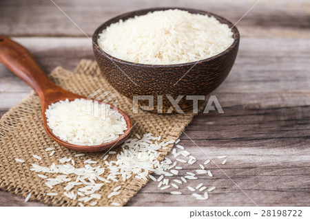 White Thai jasmine rice on wooden plank 28198722
