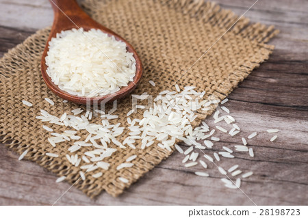 White Thai jasmine rice on wooden plank 28198723