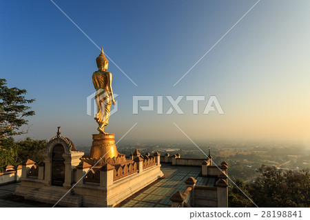 Golden buddha statue in Thai temple, Wat Phra That Khao Noi in Nan province, Thailand Golden buddha statue in Thai temple, Wat Phra That Khao Noi in Nan province, Thailand 28198841