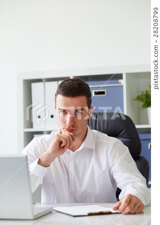 Man in a polo shirt stands leaning on railing Man in a polo shirt stands leaning on railing 28208799