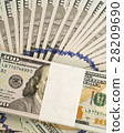 Stack of money in US dollars cash banknotes 28209690