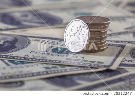 New russian ruble coin and american dollars New russian ruble coin and american dollars 28212247