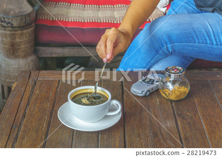 A cup of hot coffee in morning. A cup of hot coffee in morning. 28219473