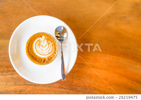 A cup of hot coffee in morning. A cup of hot coffee in morning. 28219475