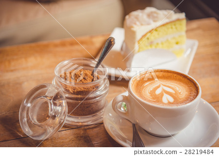 Hot coffee and cake. Hot coffee and cake. 28219484